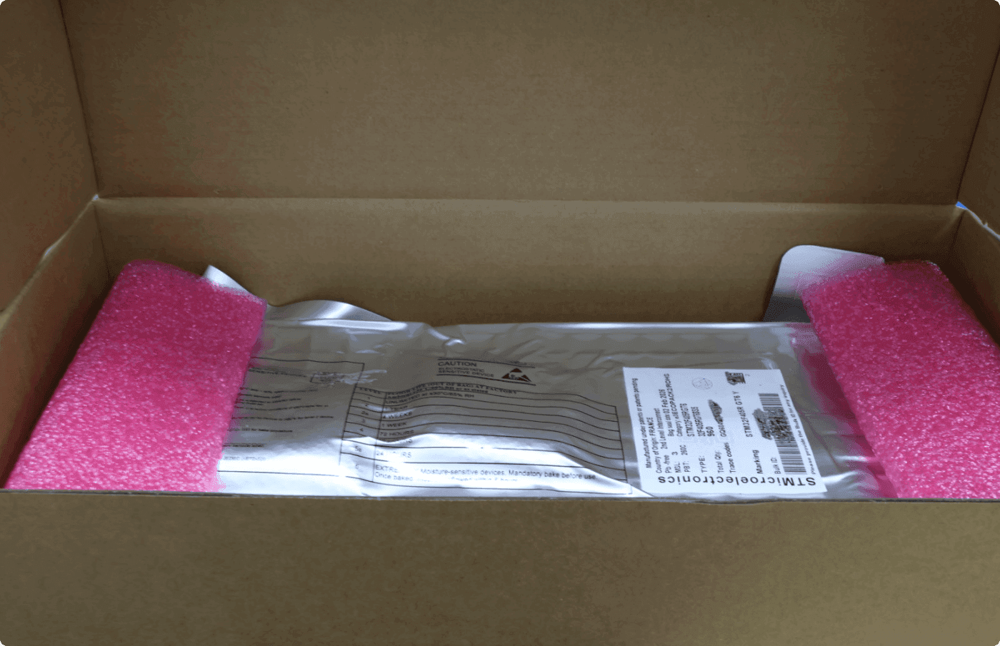 STM32F405RGT6 microcontroller chip in LQFP64 package close-up view